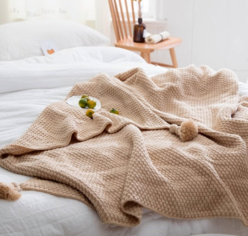 Cozy Nordic Knit Blanket with Playful Fringe and Comfort